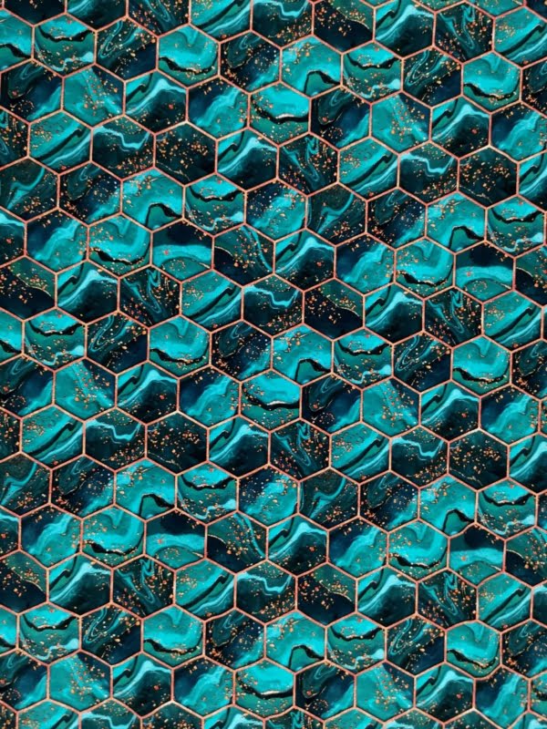 Green and gold hexagon design on stretch cotton lycra jersey fabric for sewing your own clothes.