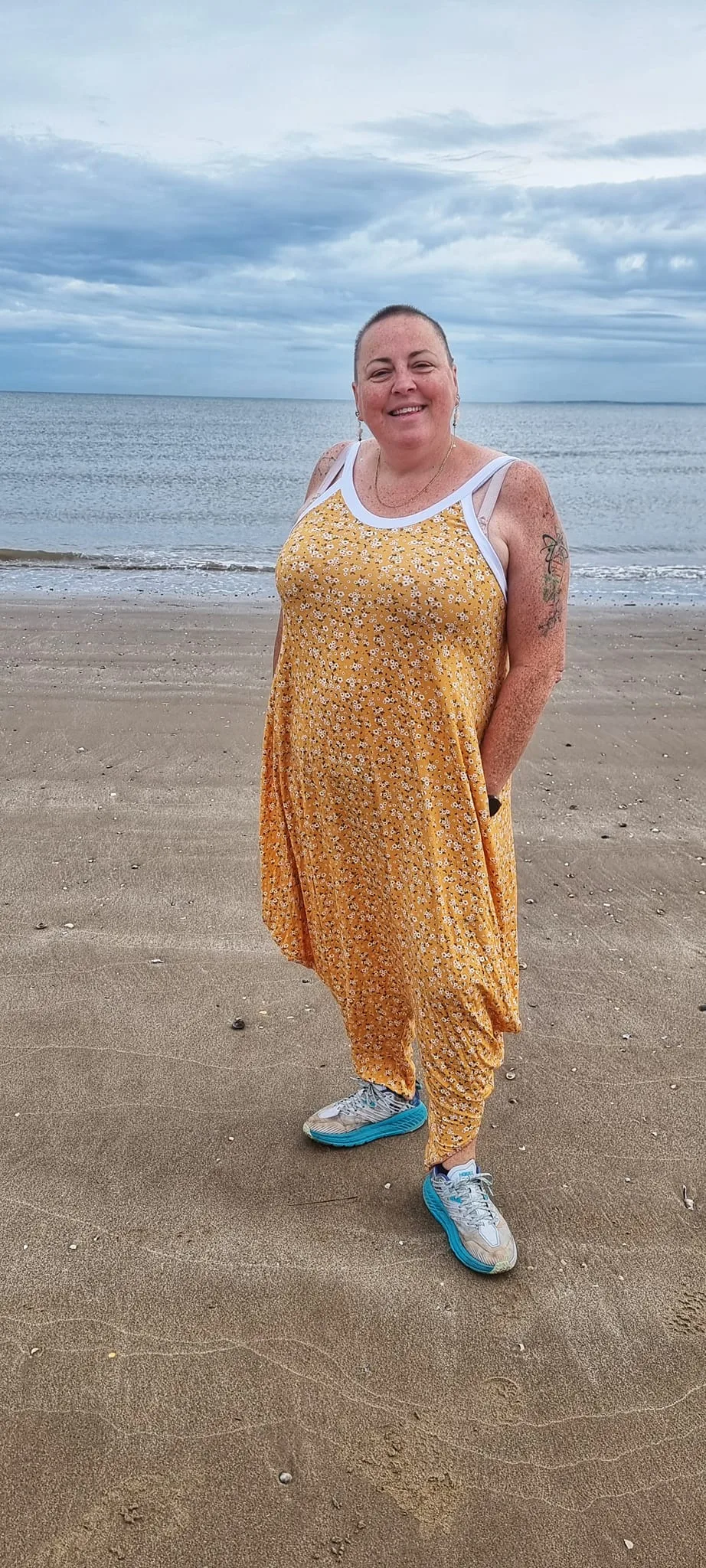 Yellow Ditsy Floral design on stretch super soft bamboo lycra jersey fabric for sewing your own clothes.