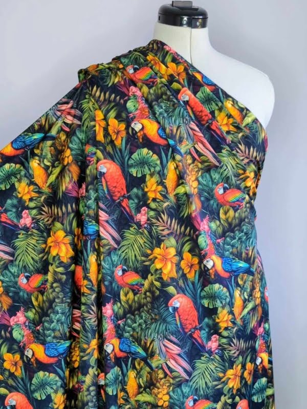 vibrant parrot Jersey Stretch Fabric draped on a mannequin