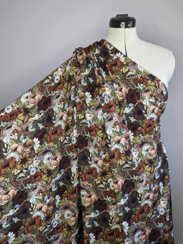 Autumn Floral Mushroom jersey Stretch Fabric on a mannequin