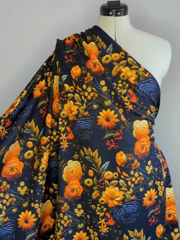 Luxurious autumn floral French Terry Jersey Stretch Fabric on a mannequin