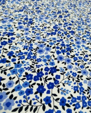 Blue Ditsy Floral Cotton Lycra Jersey Fabric £16.50 pm (With Wholesale Pricing)