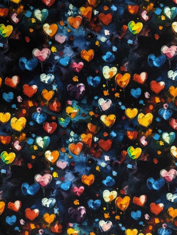 Cotton Lycra Jersey stretch Fabric with lots of multicoloured Painted Hearts.