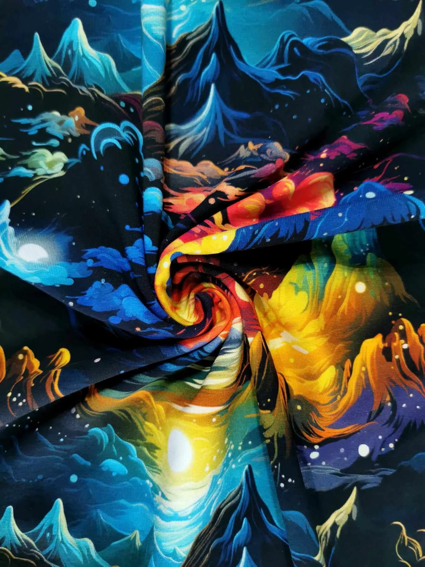 Colourful fairytale mountain landscape on high quality cotton lycra jersey fabric with four way stretch