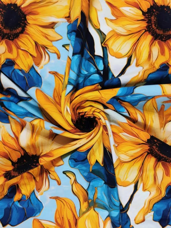 Bright yellow and green sunflower fabric wih gold, on high quality cotton lycra jersey fabric with four way stretch