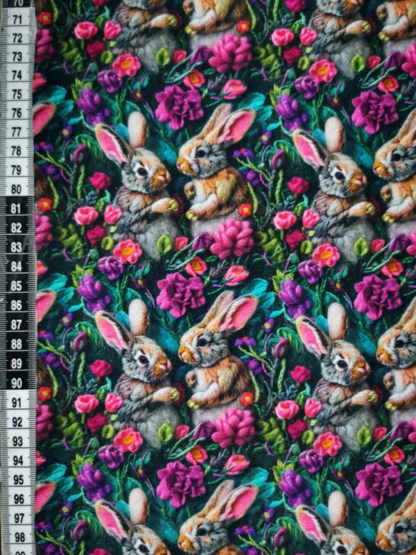 Adorable Bunny rabbits wirh pink and purple flowers. jersey fabric with 4 way stretch