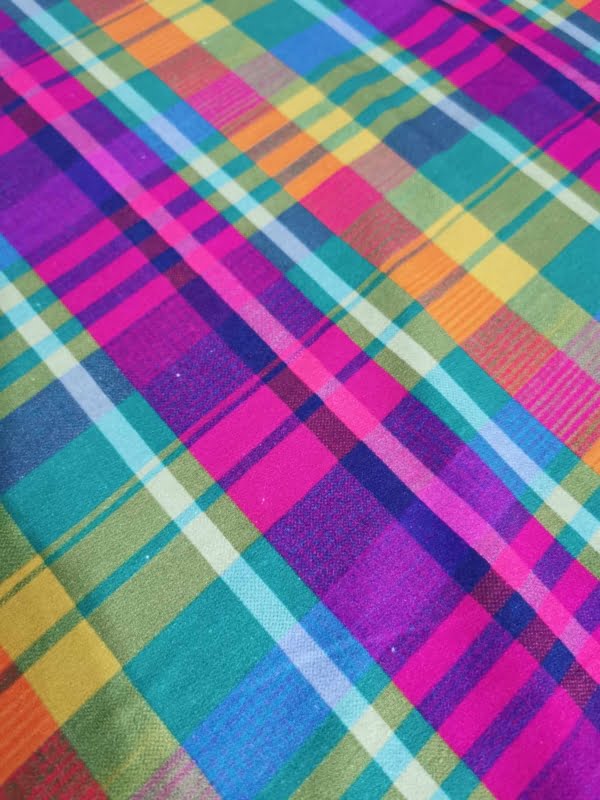 Rainbow Tartan French Terry with small white dot flaws throughout length