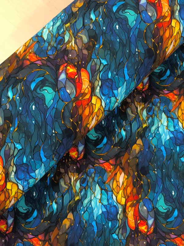 Blue and orange waves in a stained glass effect, which has been digitally printed on Stretch Cotton Jersey Fabric