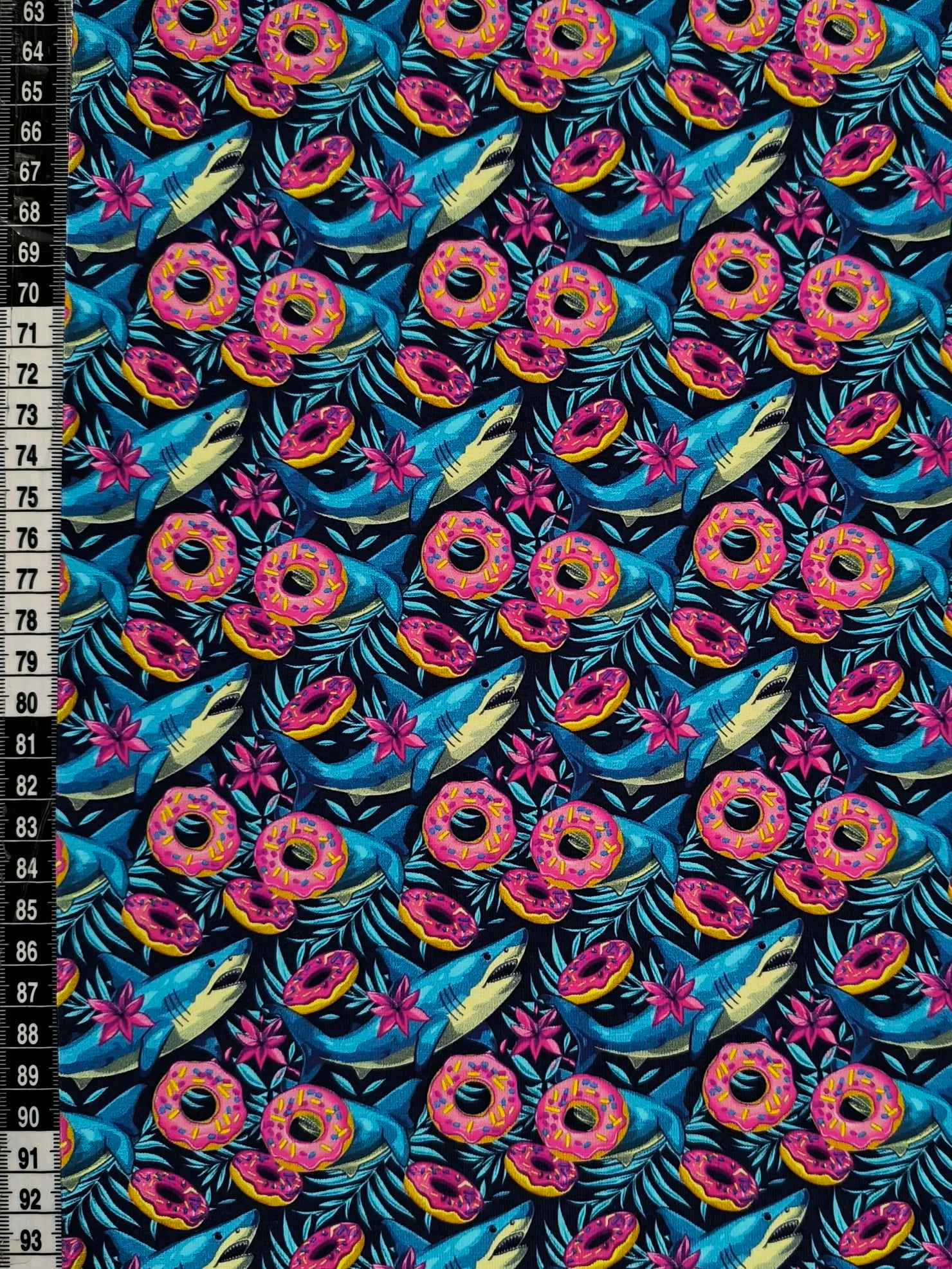 Shark Donut Jersey Fabric £16.50pm 5 Friendly sharks swimming around with donuts, fun child friendly design, which has been digitally printed on Stretch Cotton Jersey Fabric