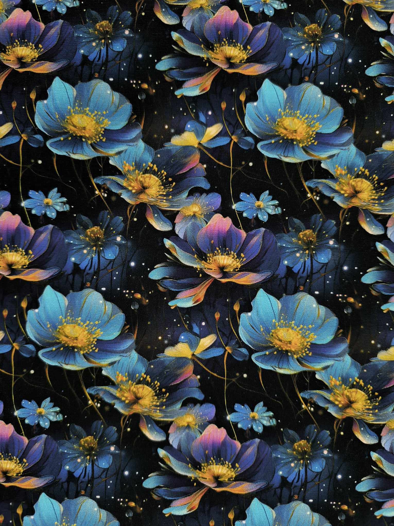 Blue flowers, on a dark background with elements of firefly glow with the floral, which has been digitally printed on Stretch Cotton Jersey Fabric