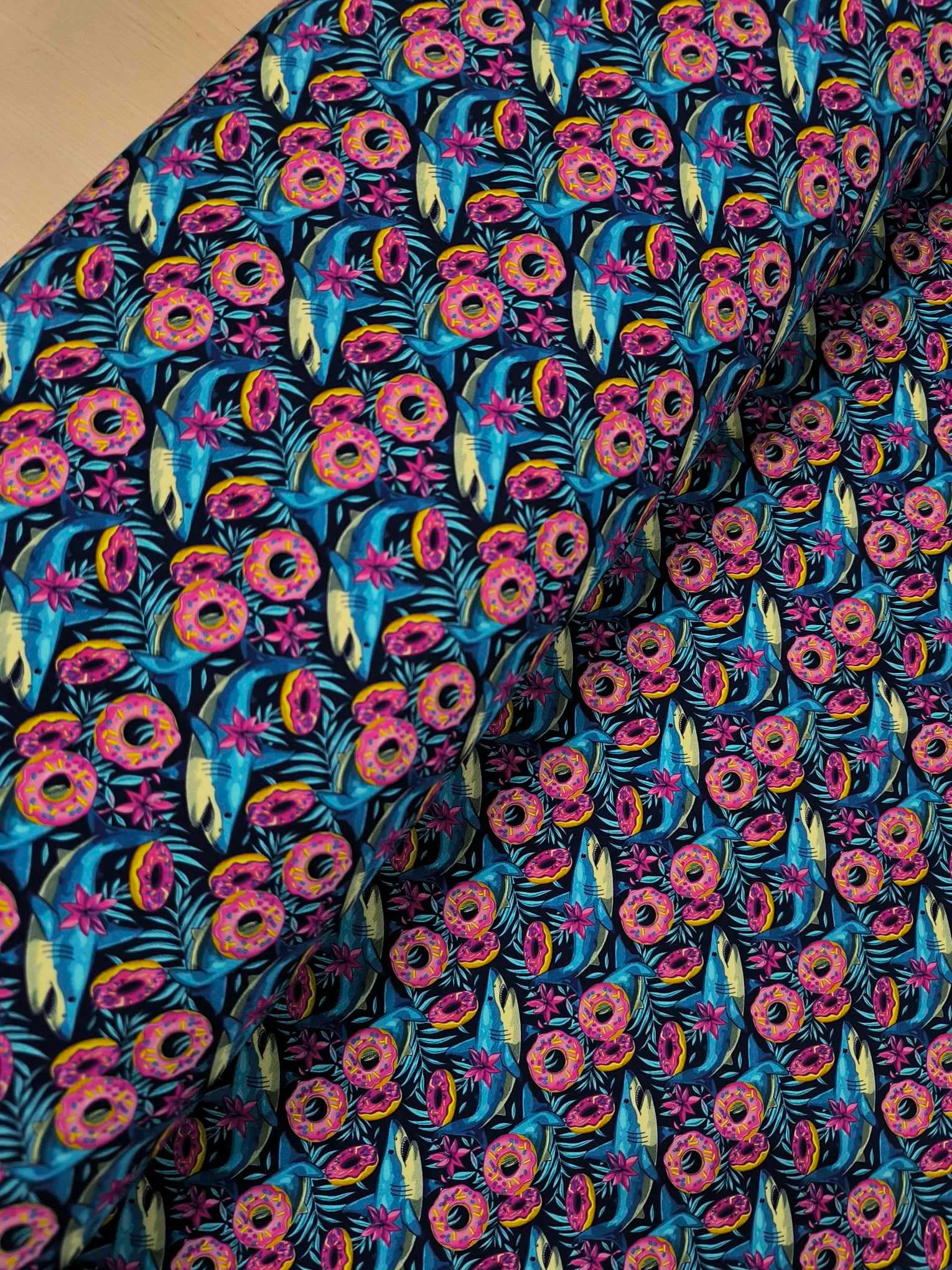 Shark Donut Jersey Fabric £16.50pm 6 Friendly sharks swimming around with donuts, fun child friendly design, which has been digitally printed on Stretch Cotton Jersey Fabric