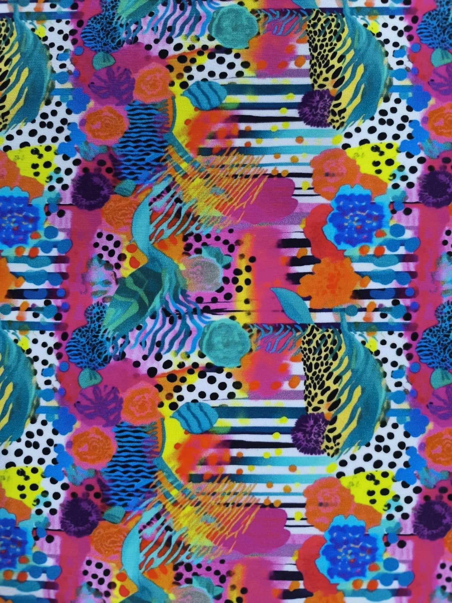 Cool lines and shapes, with vibrant colours on this geometric abstract deisgn, which has been digitally printed on Stretch Cotton Jersey Fabric