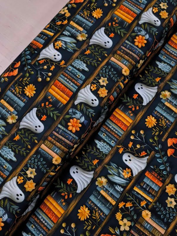 Cute Ghosts on book shelf, with colourful books, on cotton lycra jersey fabric