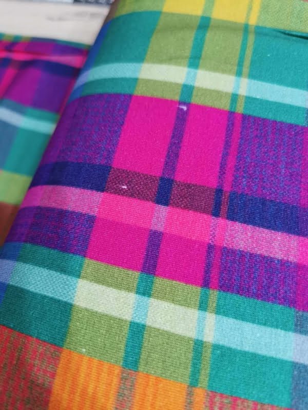 Rainbow Tartan French Terry with small white dot flaws throughout length