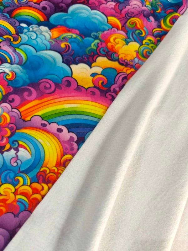 vibrant rainbow design on super soft squish fabric, a stretchy snuggly polyester material.