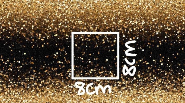 A gold glitter effect design, with black and gold gradients. It looks like glitter, but it is printed on - so it is super soft. This design is on a black background, a beautiful jersey stretch fabric for sewing clothes.