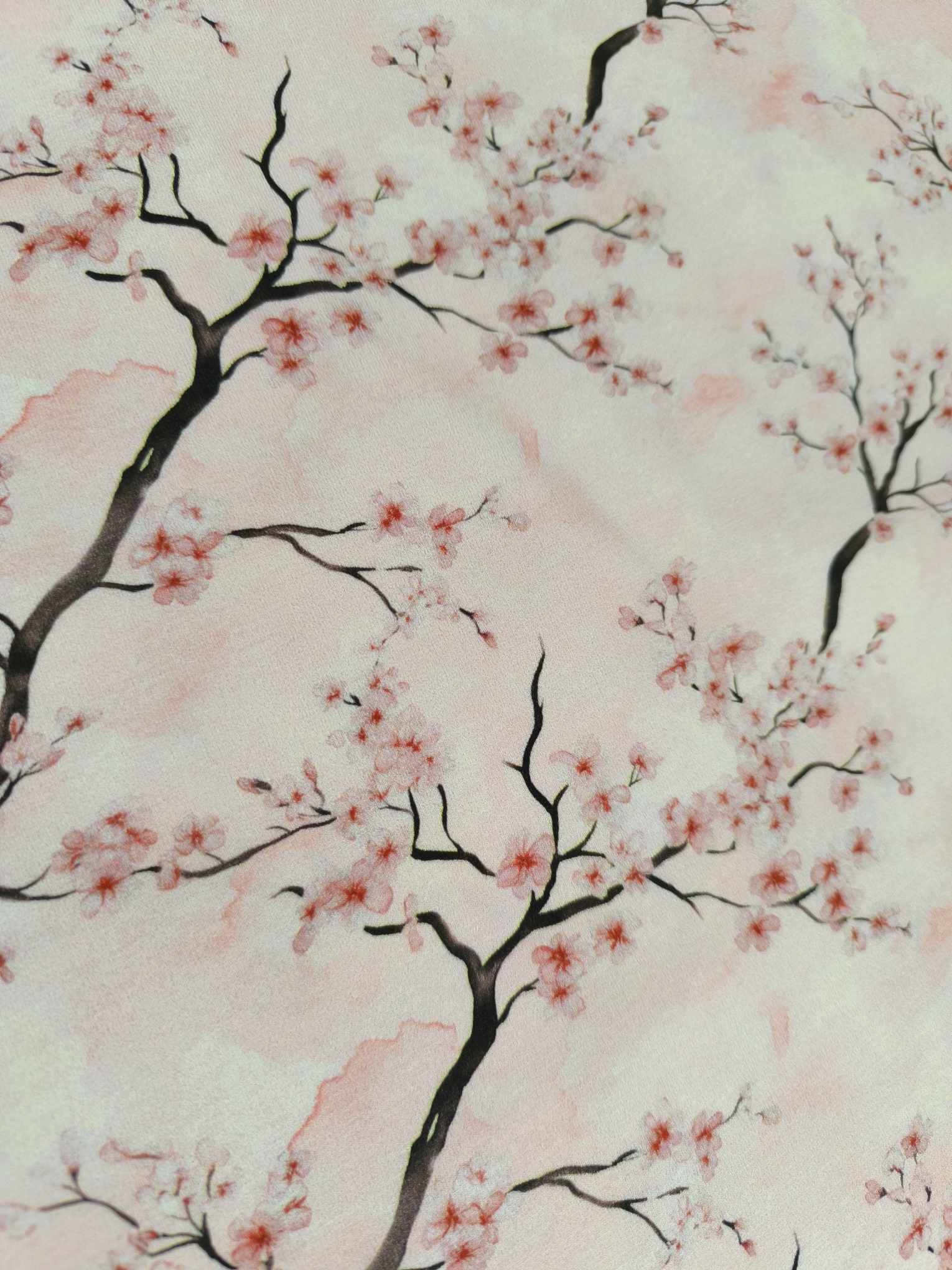 Cherry blossom on a Delicate pink watercolour background on beautiful quality stretch jersey fabric, perfect for sewing your own clothes.