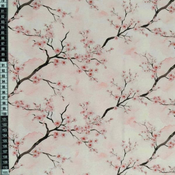 Cherry blossom on a Delicate pink watercolour background on beautiful quality stretch jersey fabric, perfect for sewing your own clothes.