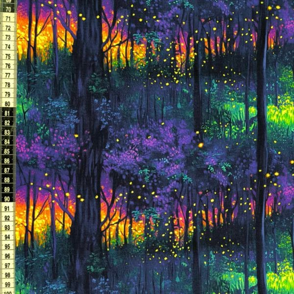 vibrant sunset colours in a deep dark woodland, flashes of yellow pink purple and blue on beautiful quality stretch jersey fabric, perfect for sewing your own clothes.