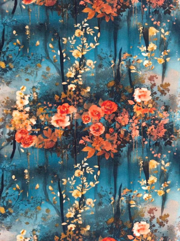 Beautiful floral design with orange and gold flowers, with blue and white clouds merging in the bakcground on beautiful quality stretch jersey fabric, perfect for sewing your own clothes.