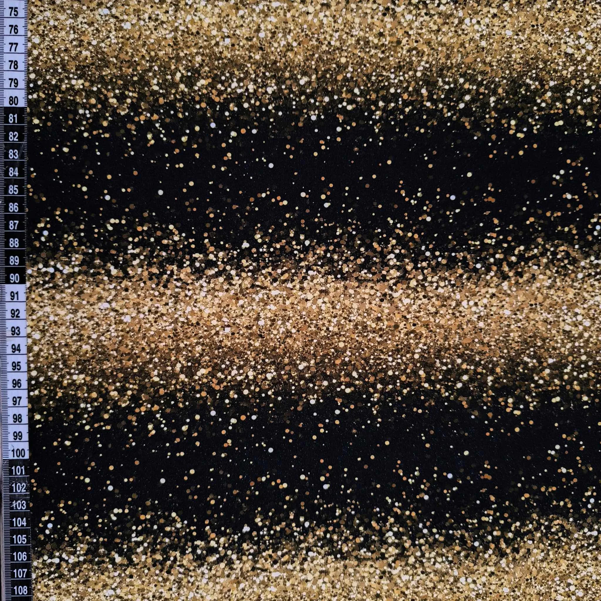Gold & Black Glitter Jersey Fabric £16.50pm 5 stripes of Black and gold glitter effect, merging into one another, looks realistic but it is printed on beautiful quality stretch jersey fabric, perfect for sewing your own clothes.