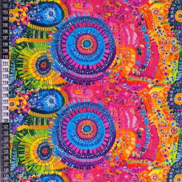 Stunning vibrant mandala design with blue circles and pink features on beautiful quality stretch jersey fabric, perfect for sewing your own clothes.