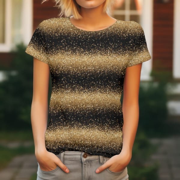 A gold glitter effect design, with black and gold gradients. It looks like glitter, but it is printed on - so it is super soft. This design is on a black background, a beautiful jersey stretch fabric for sewing clothes.