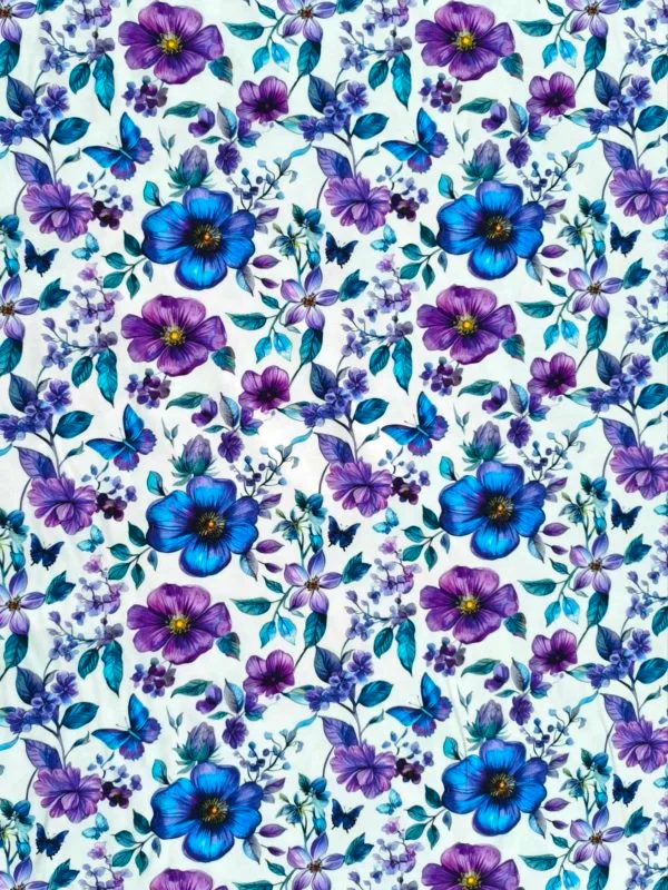 Blue and purple petals and florals, with butterflies on a white background. Jersey stretch fabric base, beautifully soft and stretchy material.