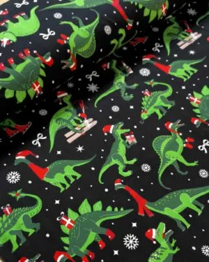Christmas Dinosaur Cotton Lycra Jersey Fabric £16.50pm 2 Christmas Dinosaur Cotton Lycra Jersey Fabric £16.50pm